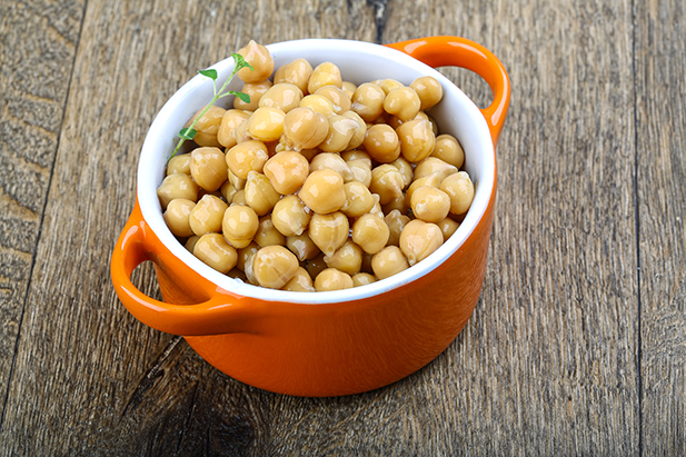 A bowl full of chickpeas, also known as garbanzo beans